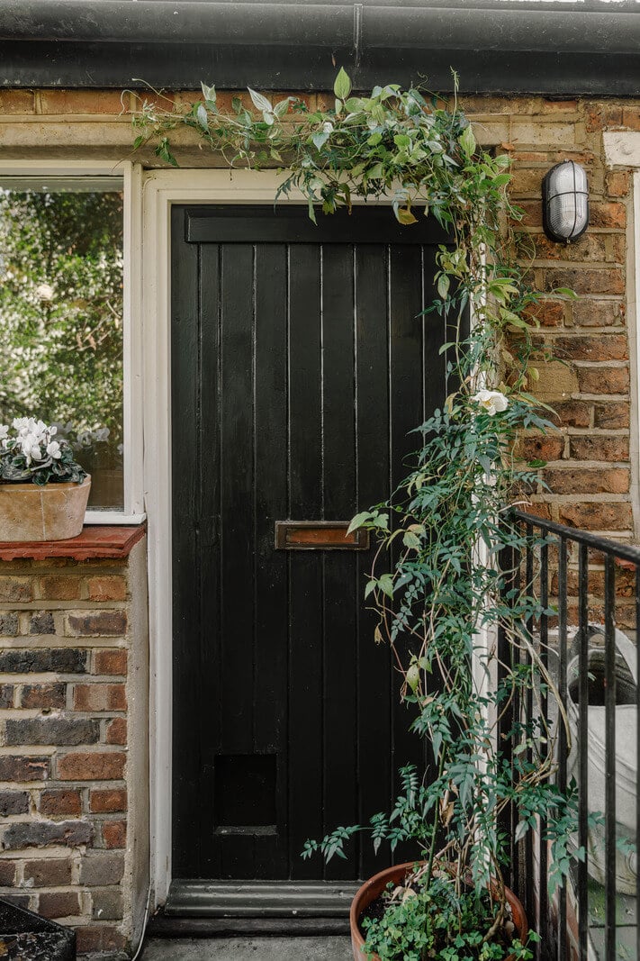 French and Midcentury Influences in a Charming London Studio Apartment 15 front door studio apartment French and Midcentury Influences in a Charming London Studio Apartment