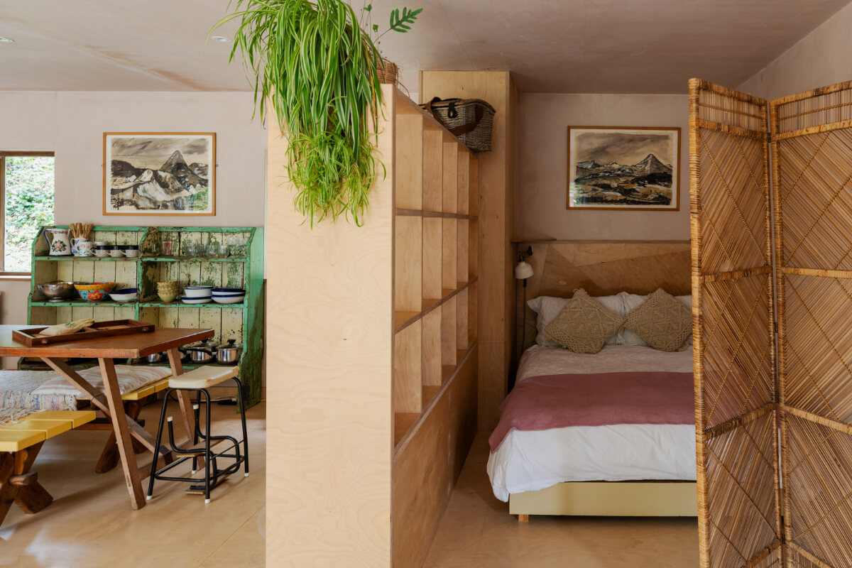 A Strong Color Palette in a Unique Country House in Cornwall 25 garden studio with bed nook