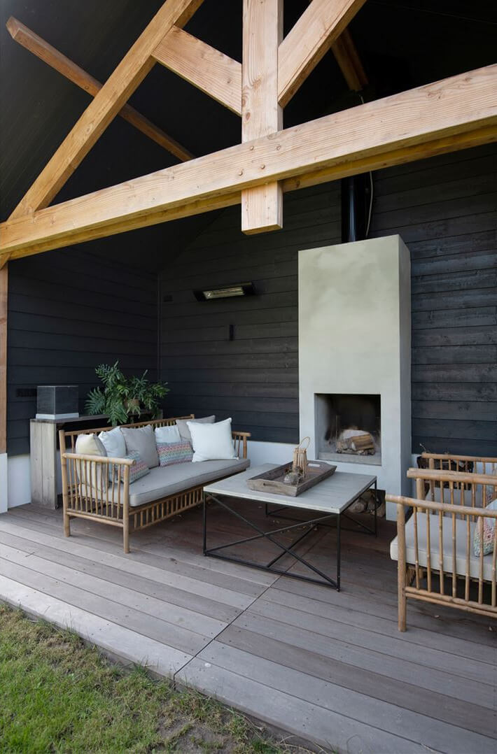 An Amazing Family Home in a Former Dutch Train Station 22 garden terrace with fireplace