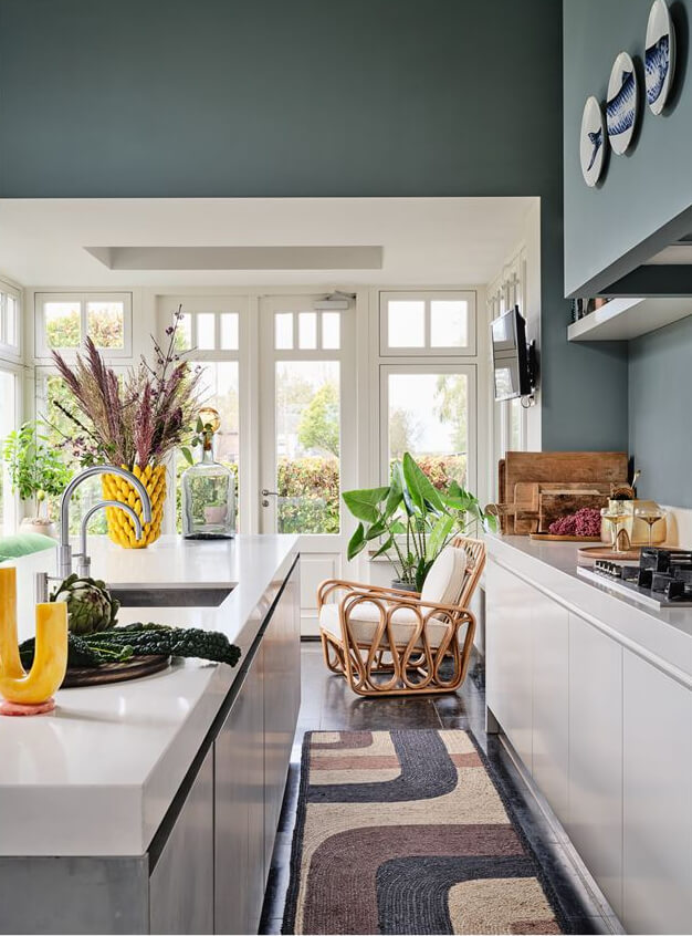 An Amazing Family Home in a Former Dutch Train Station 11 glossy white modern kitchen in a classic dutch house nordroom