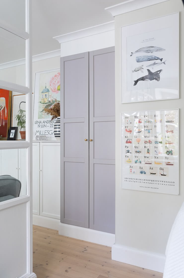 A Small and Bright Two-Bedroom Apartment in Stockholm 10 gray built in wardrobe