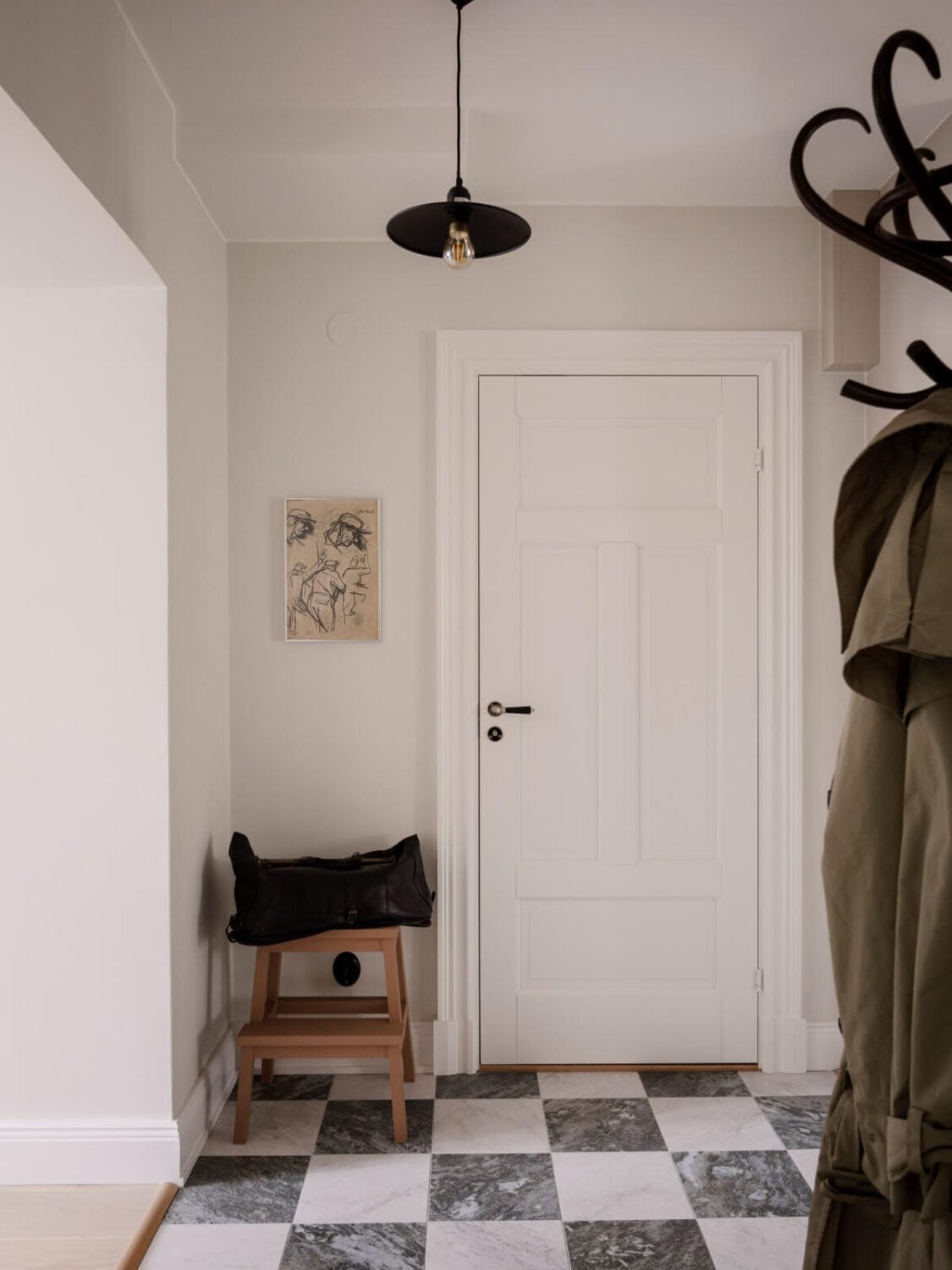 A Calm and Contemporary Apartment in a Former Office Space 25 hall with checkerboard marble floor A Calm and Contemporary Apartment in a Former Office Space