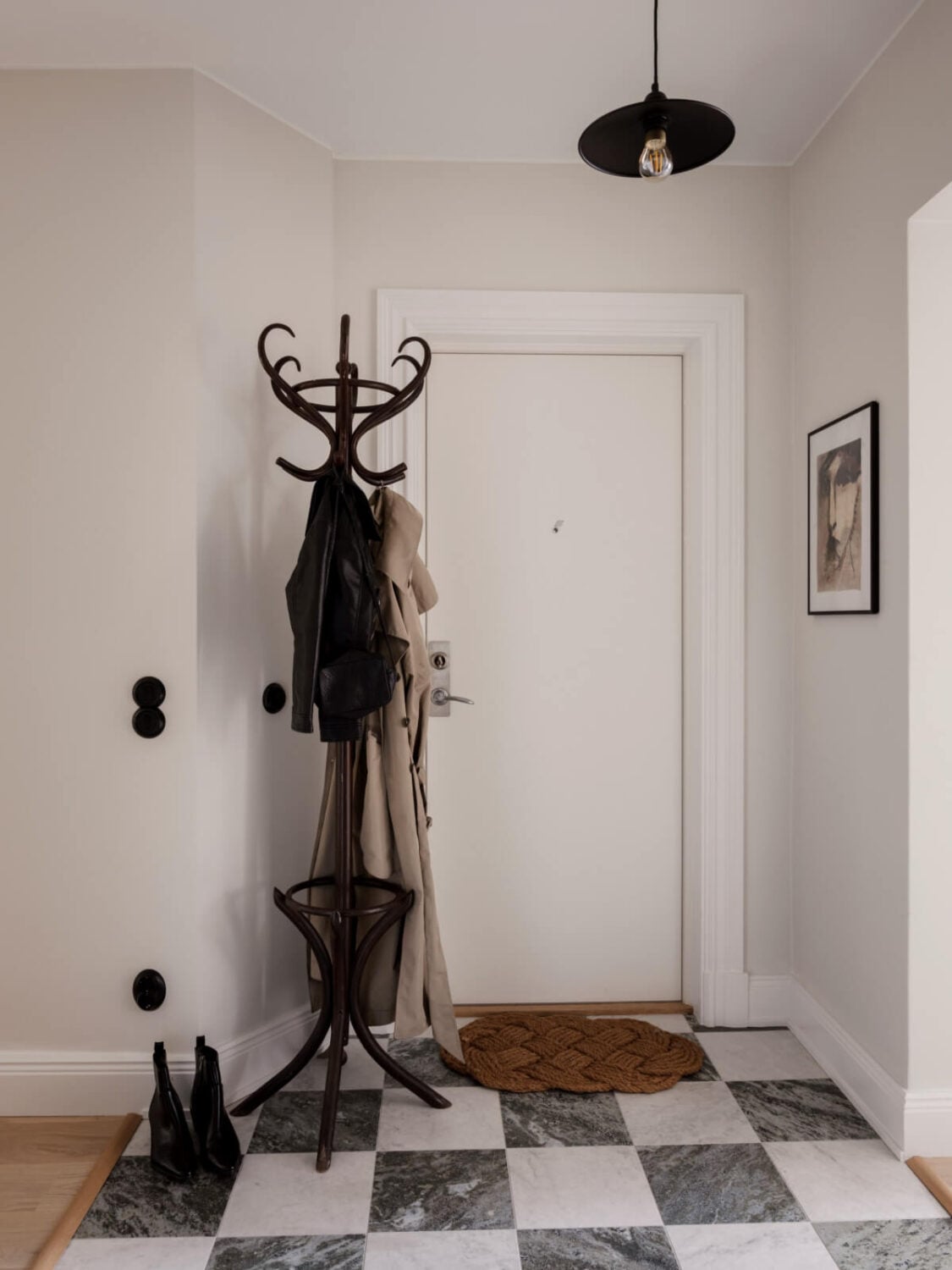 A Calm and Contemporary Apartment in a Former Office Space 26 hallway with checkerboard floor