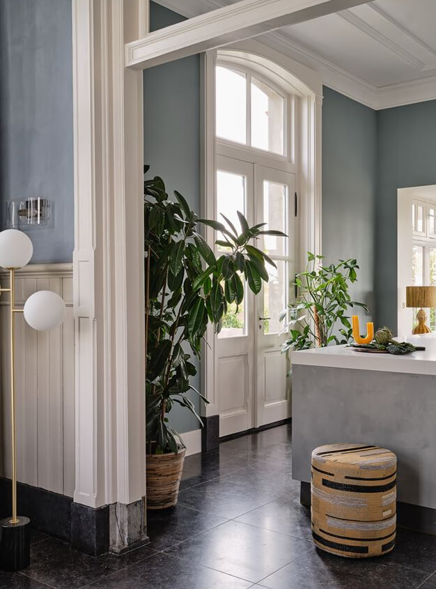 An Amazing Family Home in a Former Dutch Train Station 12 kitchen detail with doors to the garden