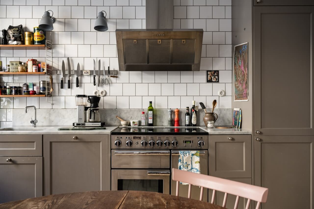 Muted Tones, Art, and Books in a Charming Stockholm Apartment 9 kitchen detail