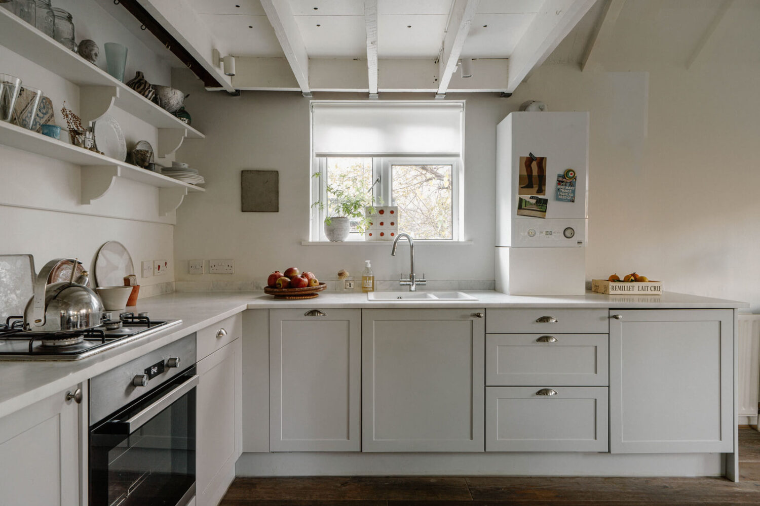 French and Midcentury Influences in a Charming London Studio Apartment 10 kitchen in london studio apartment