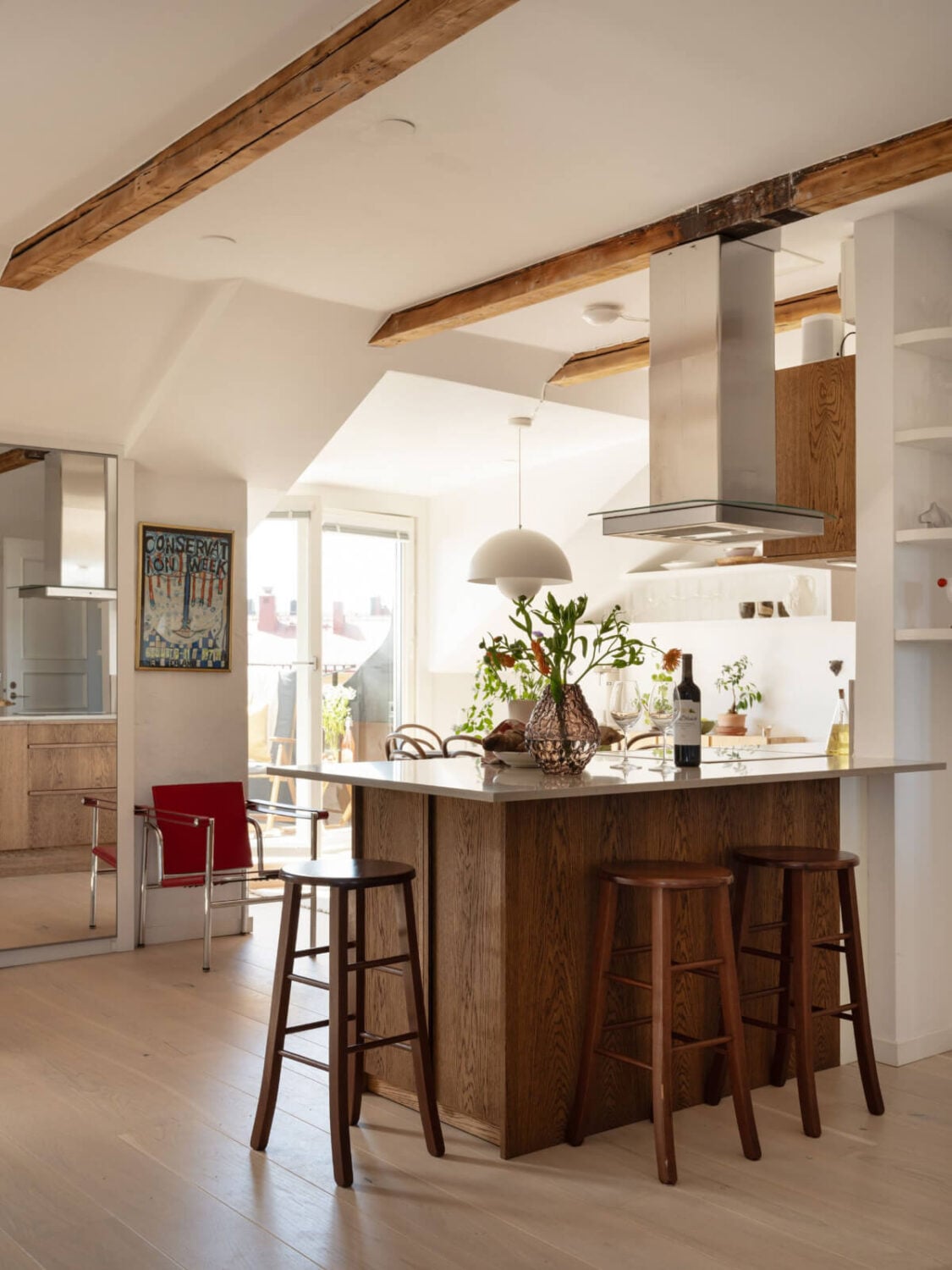 A Charming Light-Filled Attic Apartment with a Dark Oak Kitchen 10 kitchen island bar seating