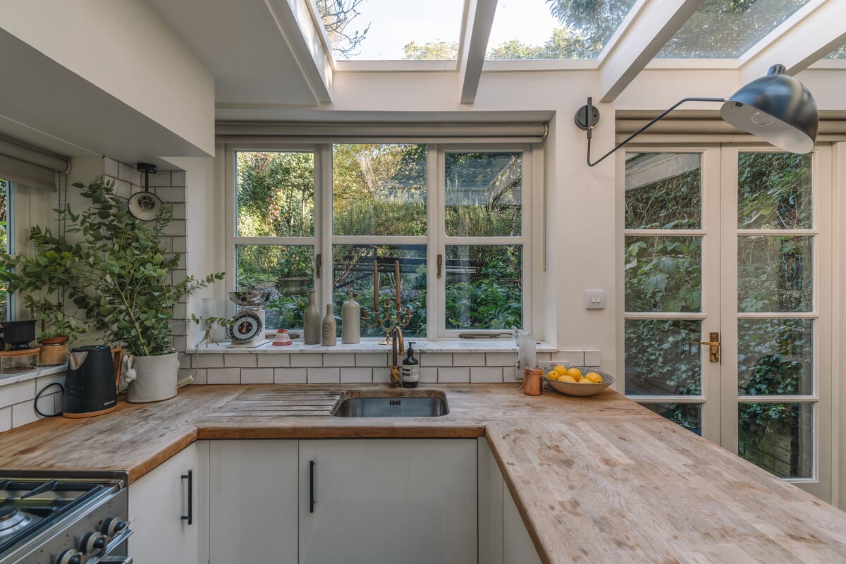 A Charming Garden Apartment in North Kensington 8 kitchen with wooden countertop