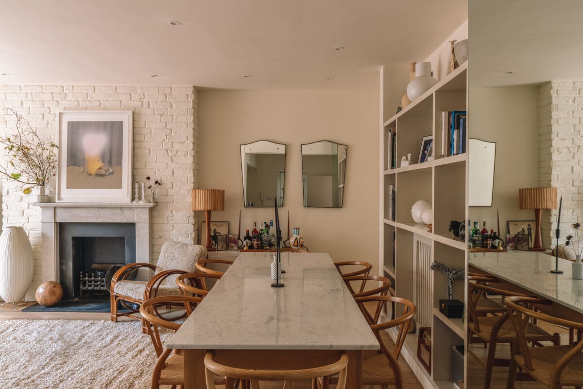 A Charming Garden Apartment in North Kensington 5 large dining table and exposed brick wall