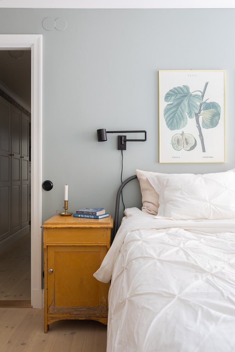 A Small and Bright Two-Bedroom Apartment in Stockholm 21 light gray bedroom detail