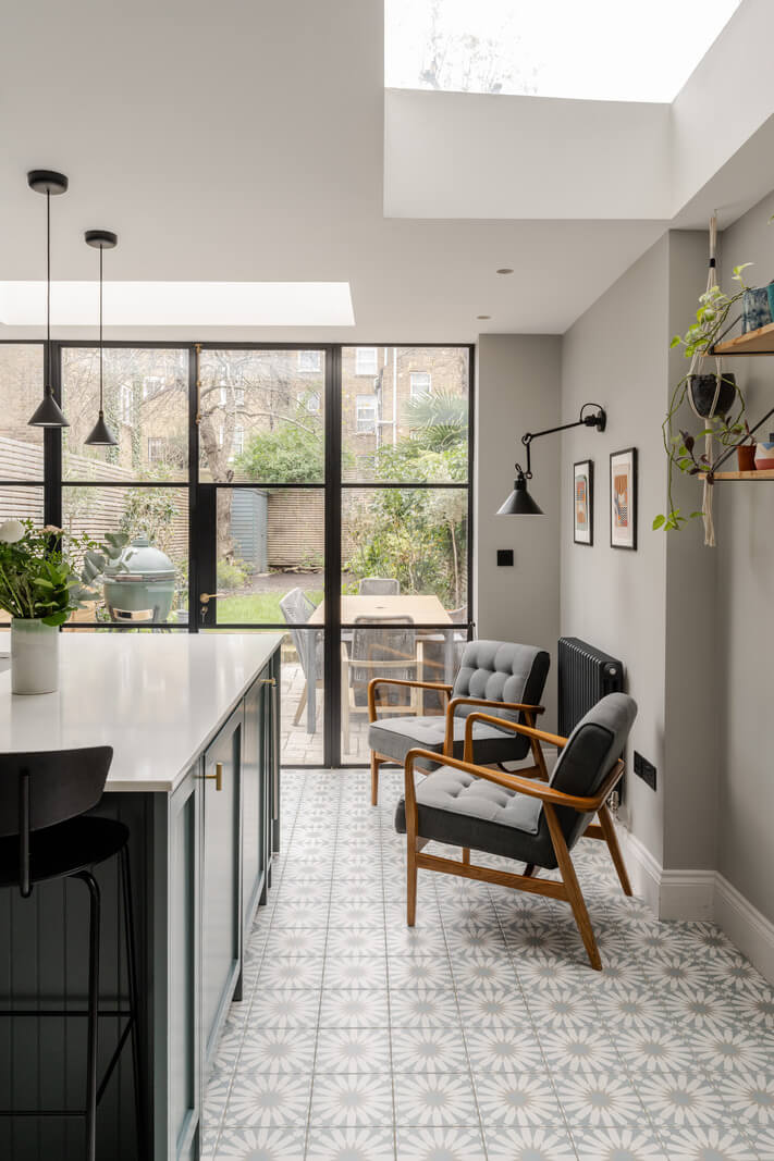 A Beautiful Extended Victorian Family Home in London 7 light gray kitchen walls and comfy chairs A Beautiful Extended Victorian Family Home in London