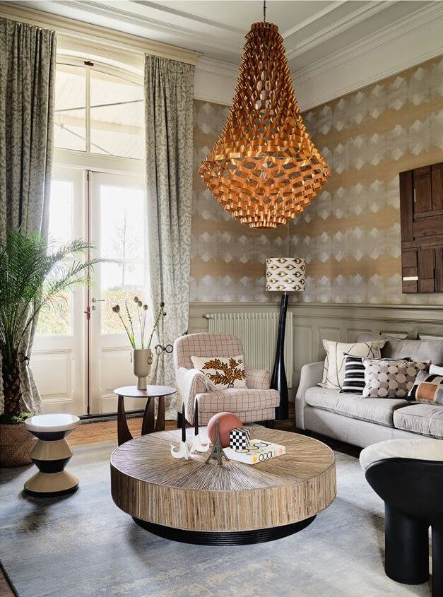 An Amazing Family Home in a Former Dutch Train Station 7 living room with high ceilings period features and wallpaper nordroom