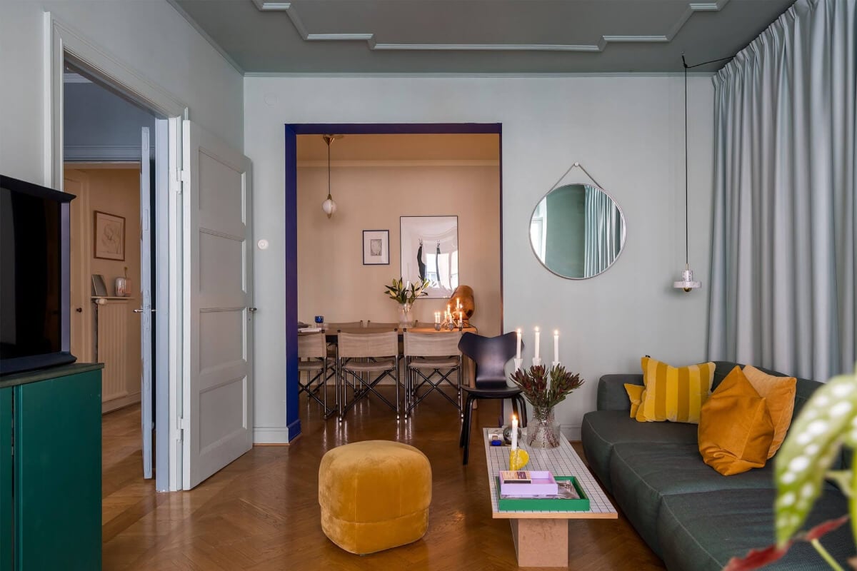 An Interior Designer's Moody Apartment with Period Features 4 living room with kobalt blue doorway