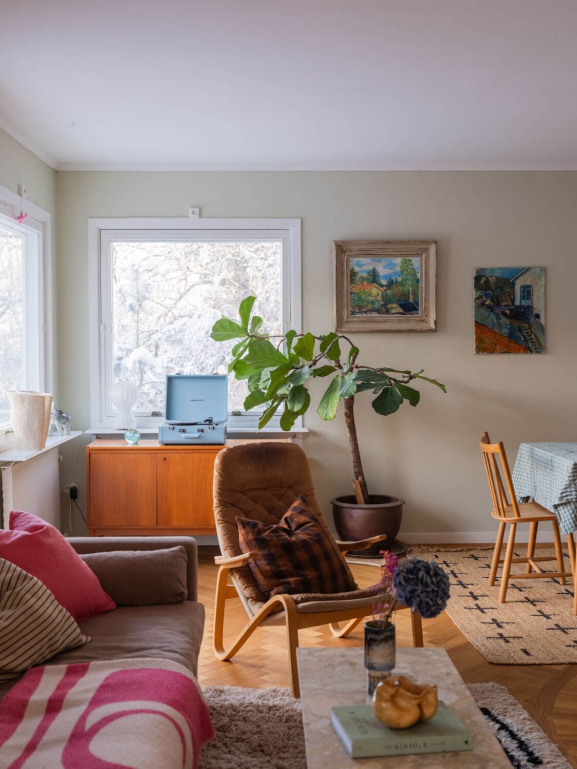 A Beautiful Midcentury Family Home South of Stockholm 12 living room with parquet floor midcentury style