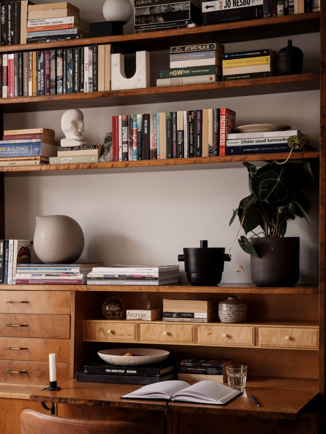 A Calm and Contemporary Apartment in a Former Office Space 5 midcentury desk with shelves