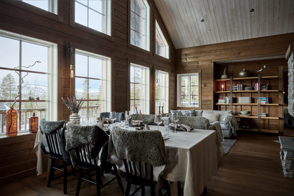 A Warm and Inviting Mountain House in Sweden 2 open plan living space swedish log house A Warm and Inviting Mountain House in Sweden