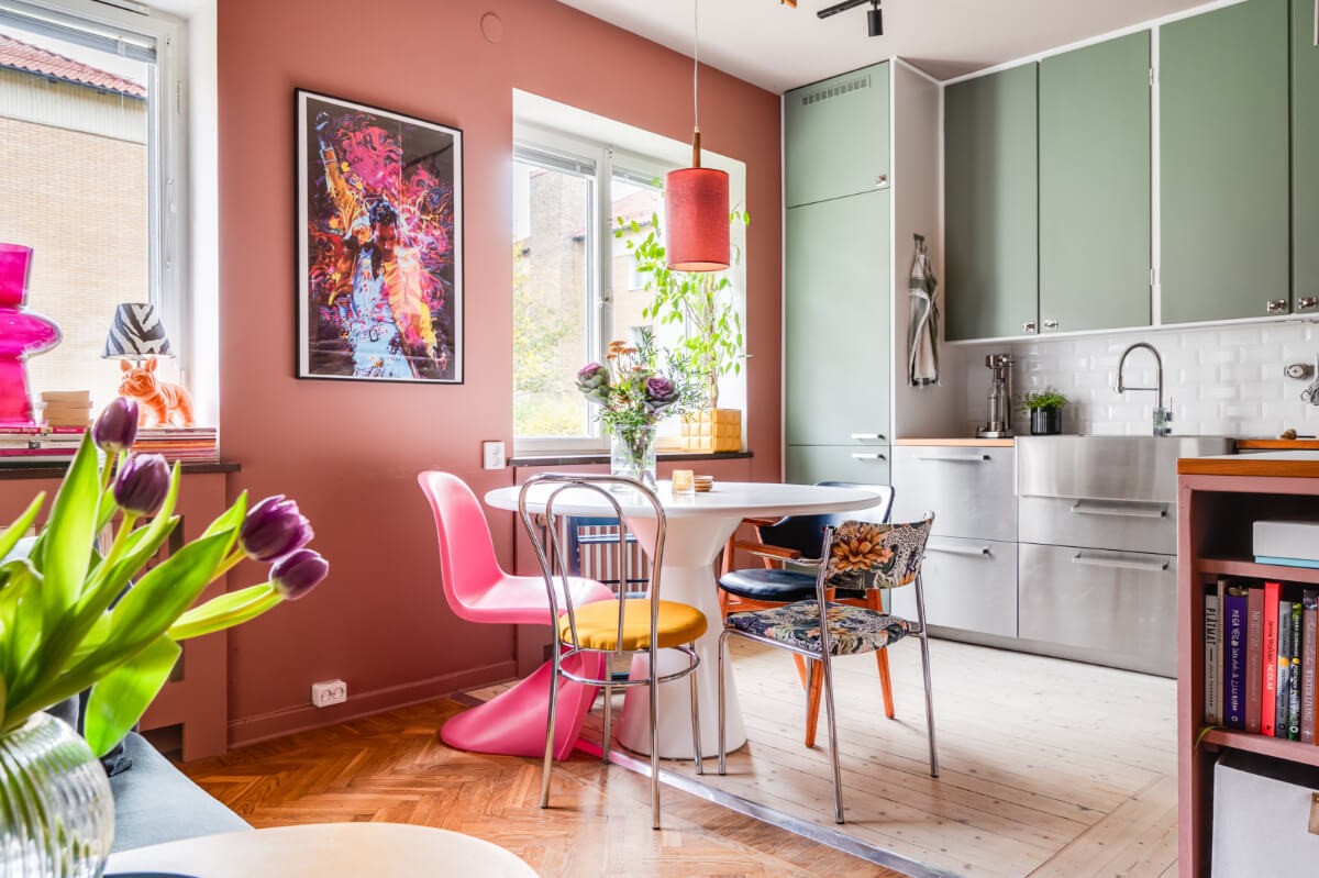 A Vibrant, Colorful Midcentury Apartment in Malmö 9 open plan living space with stainless steel and green kitchen