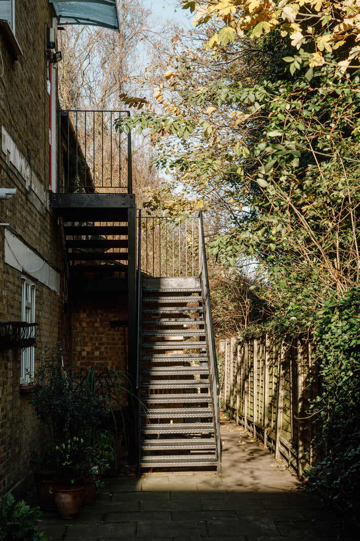 French and Midcentury Influences in a Charming London Studio Apartment 14 outdoor staircase French and Midcentury Influences in a Charming London Studio Apartment