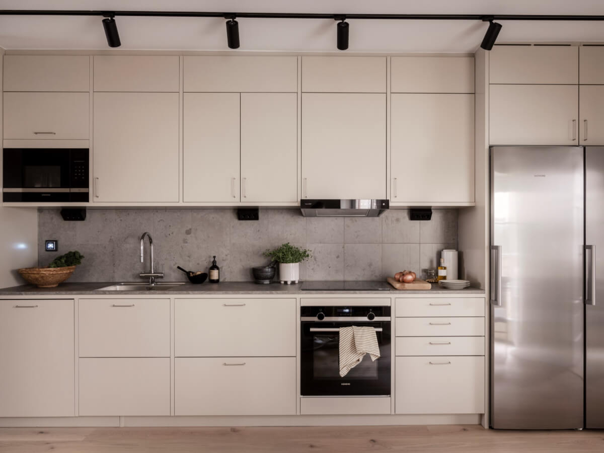 A Calm and Contemporary Apartment in a Former Office Space 9 scandi kitchen