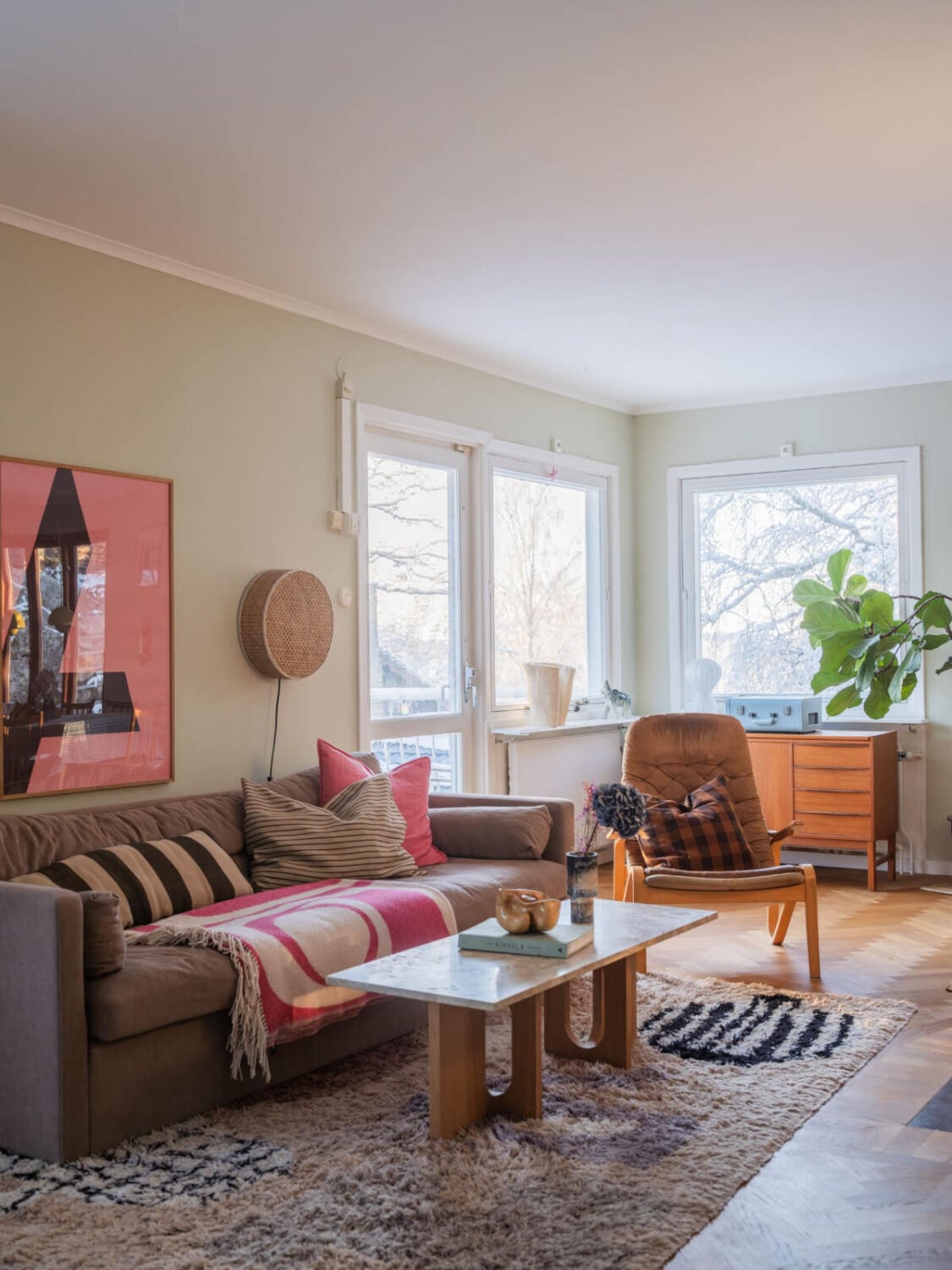 A Beautiful Midcentury Family Home South of Stockholm 14 scandi living room parquet floor