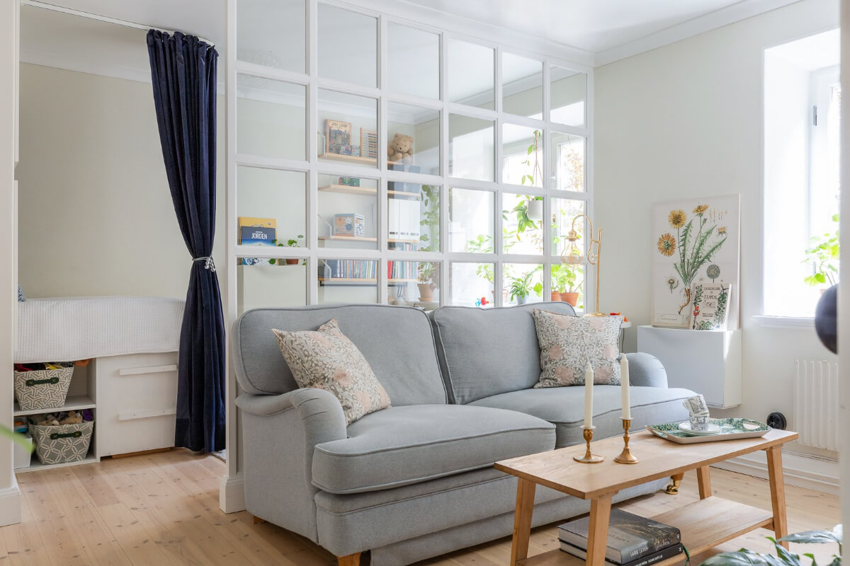 A Small and Bright Two-Bedroom Apartment in Stockholm 2 separated living room to create a childrens bedroom