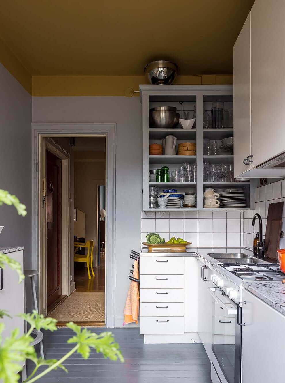 An Interior Designer's Moody Apartment with Period Features 20 simple kitchen with ochre yellow painted ceiling