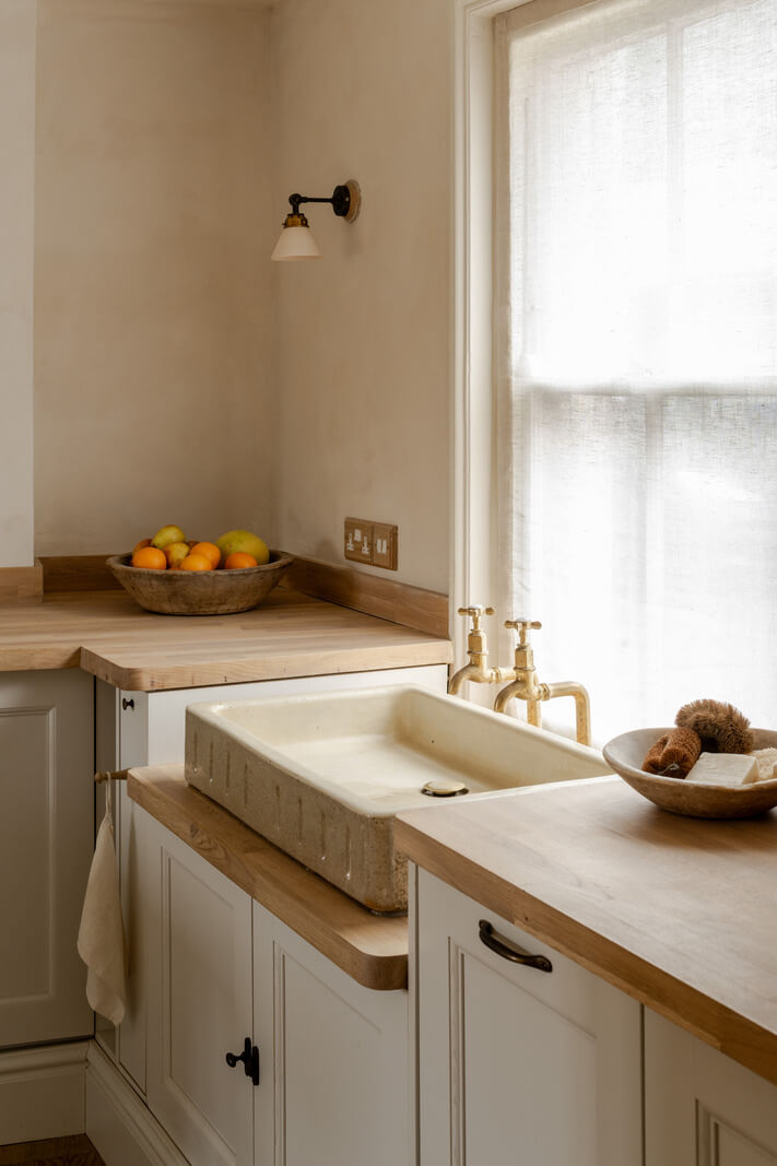 A Light Rustic Farmhouse-Style in an English Cottage 14 sink under window serene kitchen space nordroom
