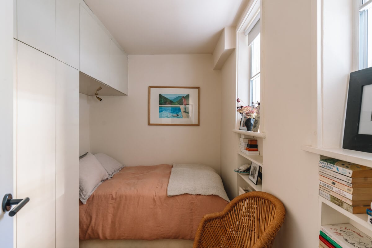 A Charming Garden Apartment in North Kensington 15 small bedroom with wardrobes above the bed