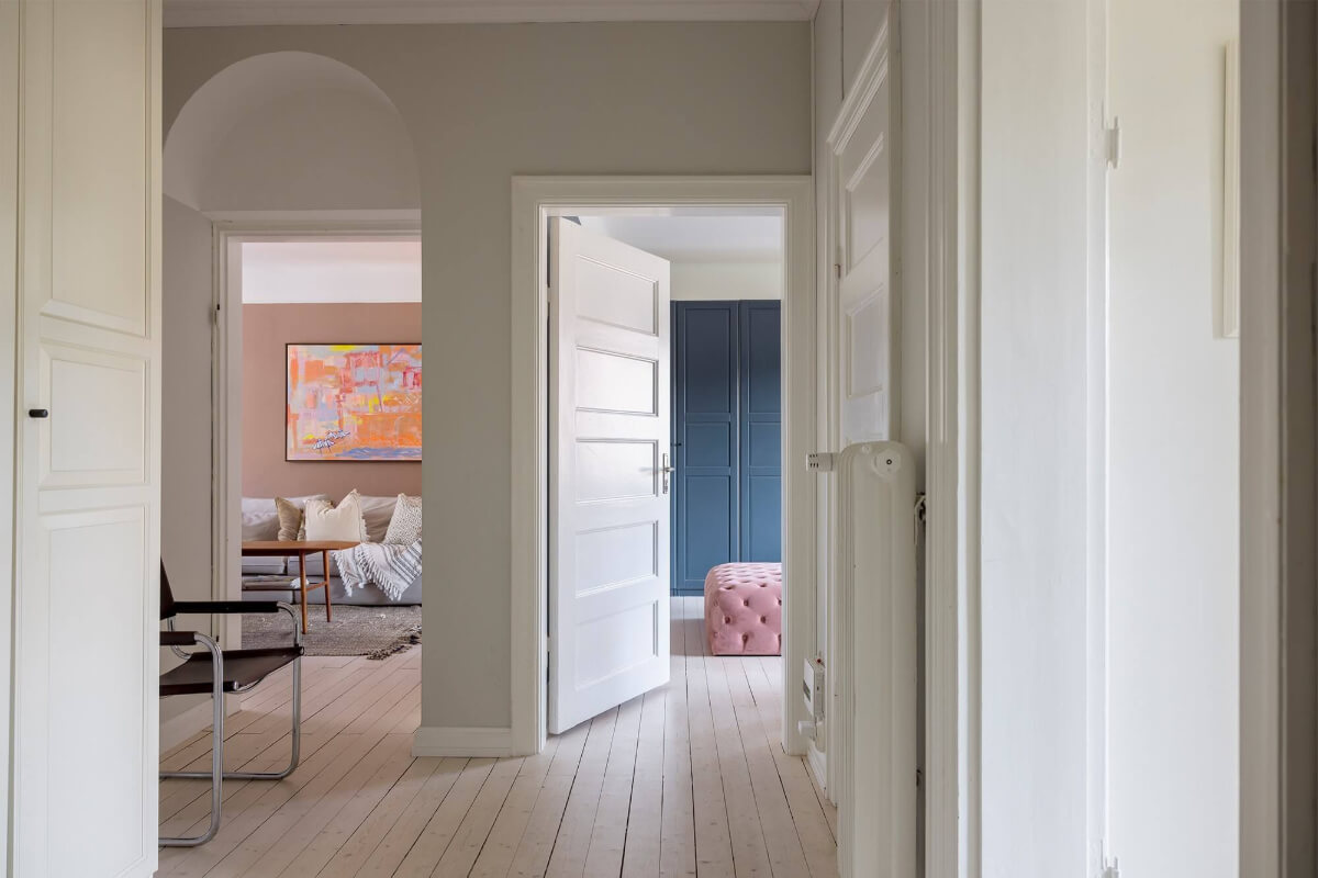A Spacious Nordic Apartment with a Wonderful Color Palette 20 spacious hall with light gray walls and simple wooden floorboards nordroom