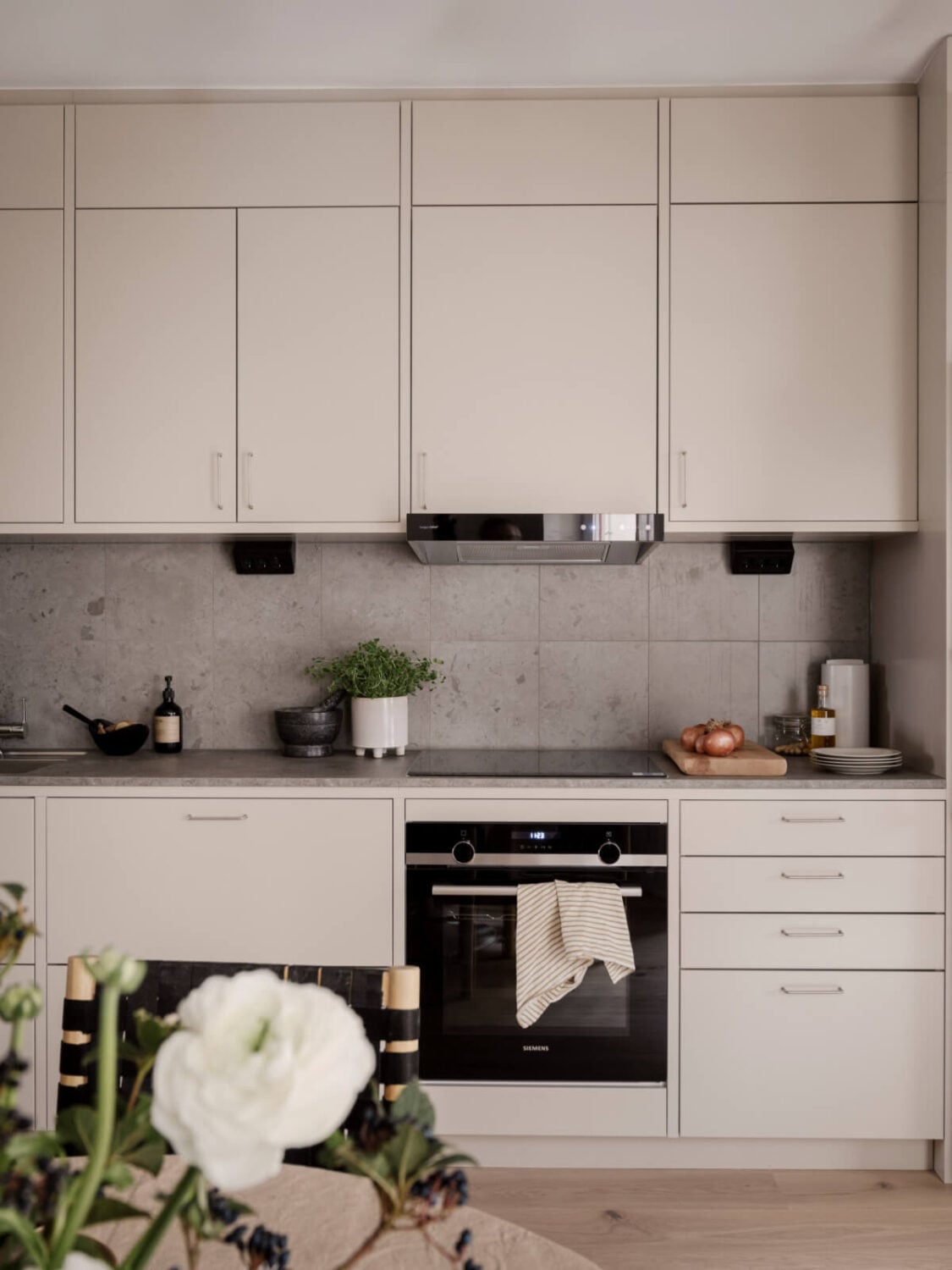 A Calm and Contemporary Apartment in a Former Office Space 10 stylish neutral scandi kitchen