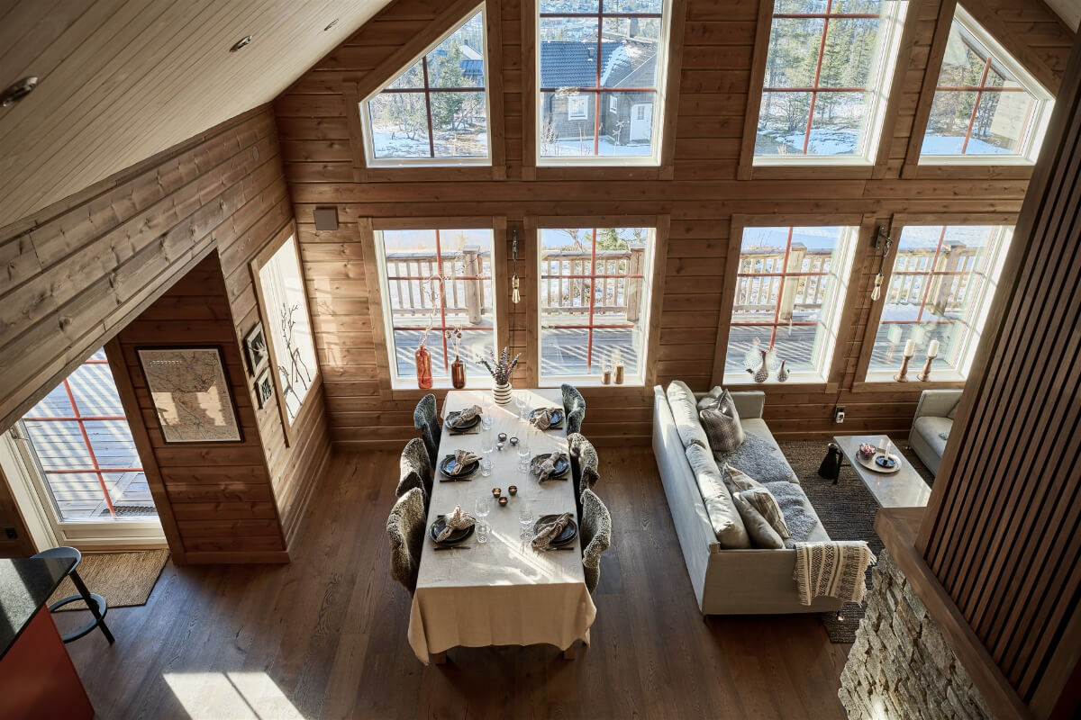 A Warm and Inviting Mountain House in Sweden 8 swedish log house living space from above A Warm and Inviting Mountain House in Sweden