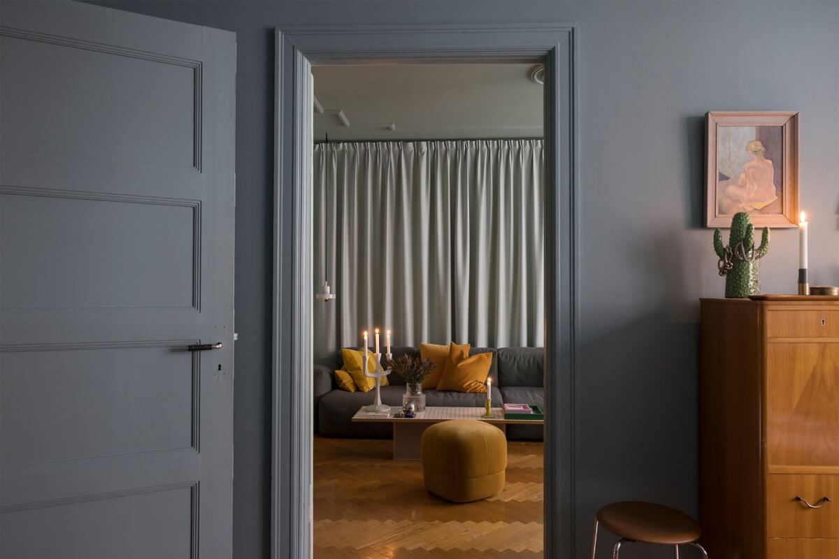 An Interior Designer's Moody Apartment with Period Features 16 view into living room