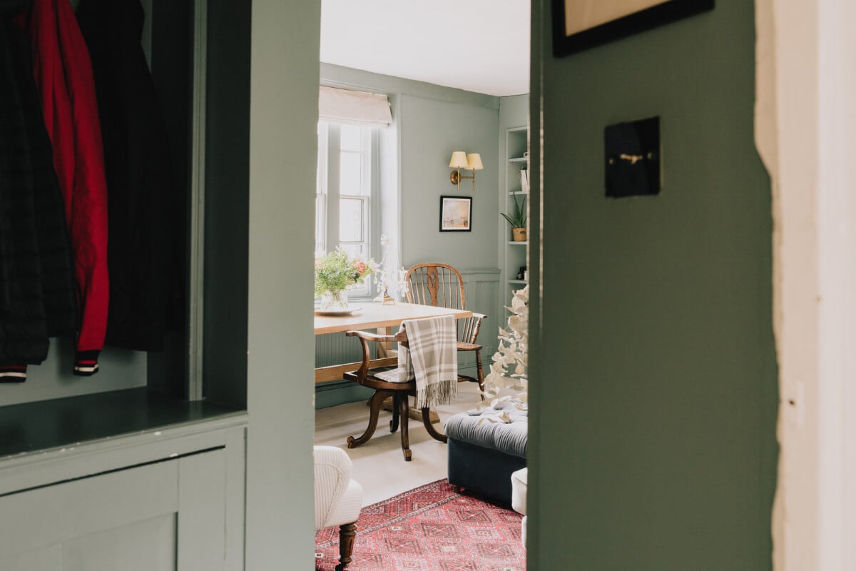 Countryside Charm in a London Apartment in a Former Ale House 10 view into small green living room