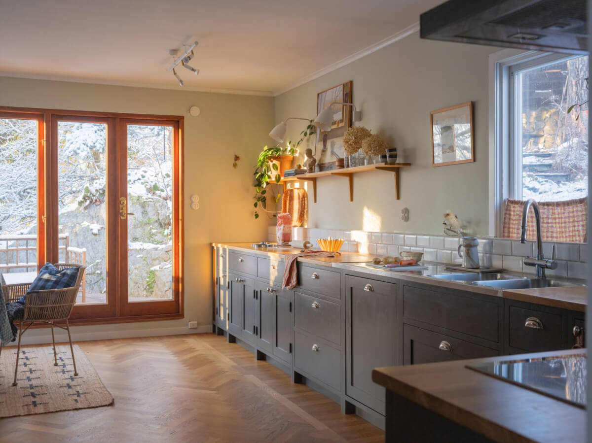 A Beautiful Midcentury Family Home South of Stockholm 2 warm kitchen gray cabinets shelf