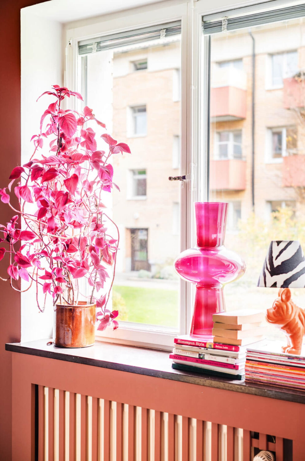 A Vibrant, Colorful Midcentury Apartment in Malmö 6 window sill with pink vase