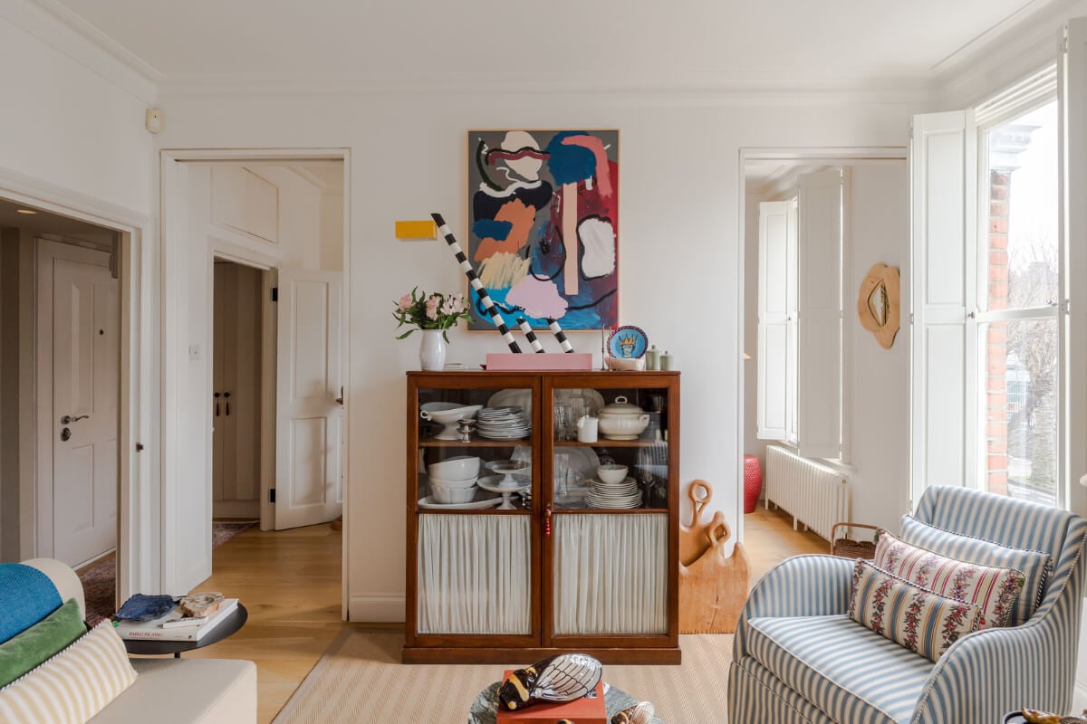 Cozy Contemporary Spaces in a Light-Filled Victorian Apartment 10 antique glass cabinet