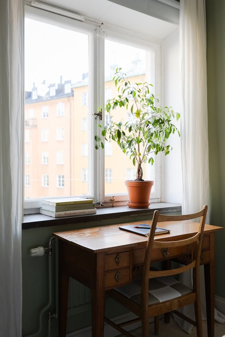 Modern Interiors in a Bright 1930s Apartment in Sweden 26 antique wooden desk