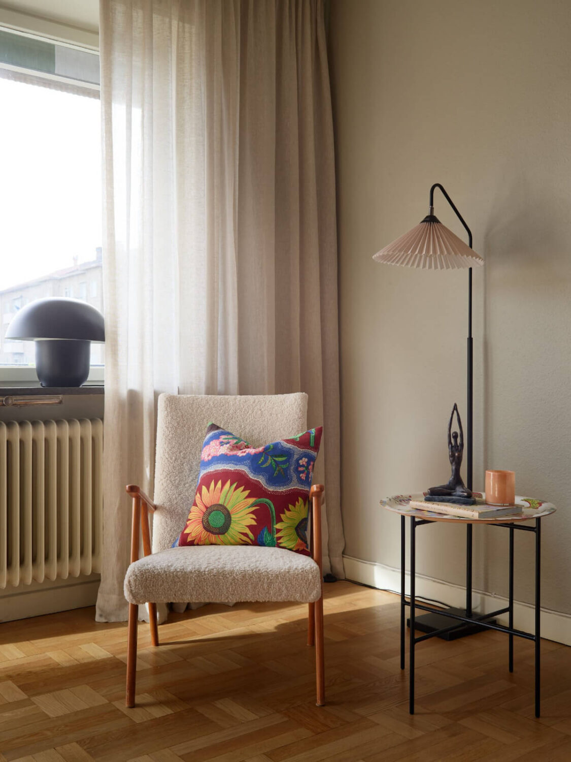 A Charming Two-Bedroom Corner Apartment in a 1940s Building 5 armchair