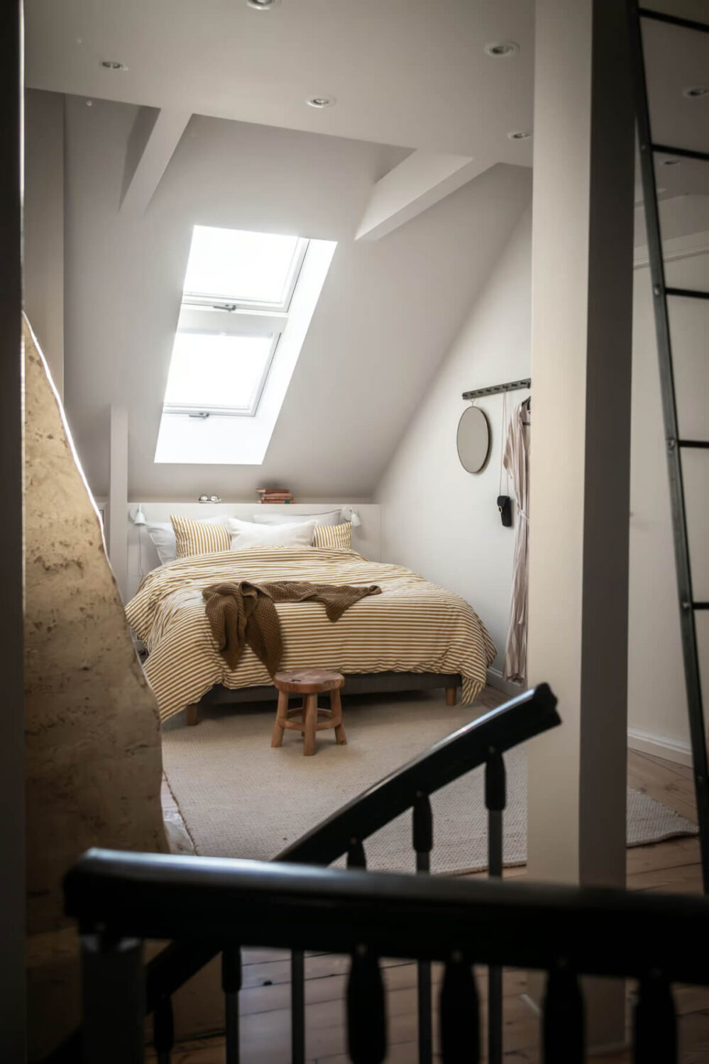 A Duplex Apartment with Period Features and a Charming Attic Bedroom 13 attic bedroom skylight