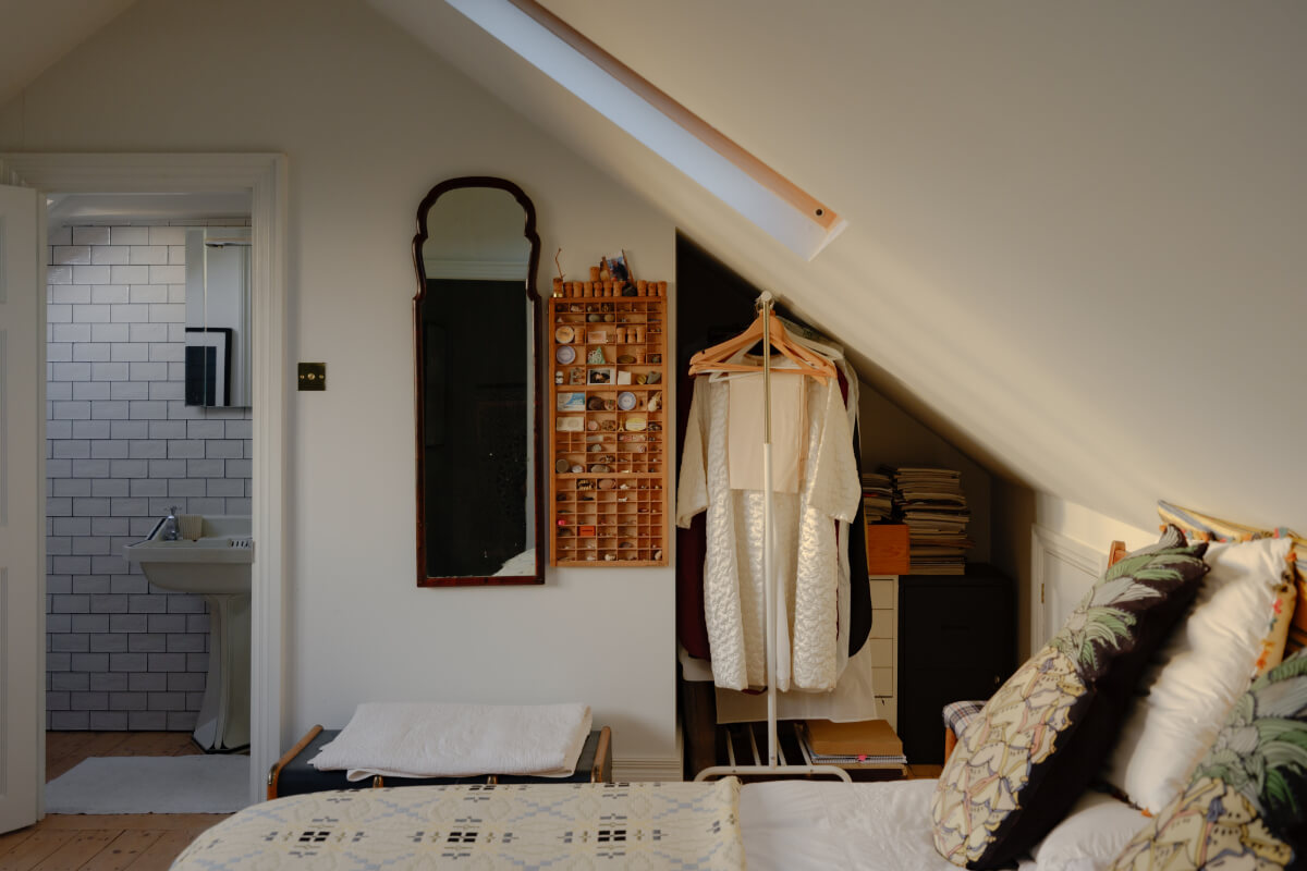 A London Edwardian House with a Light-Filled Kitchen Extension 31 attic bedroom storage under slanted ceiling