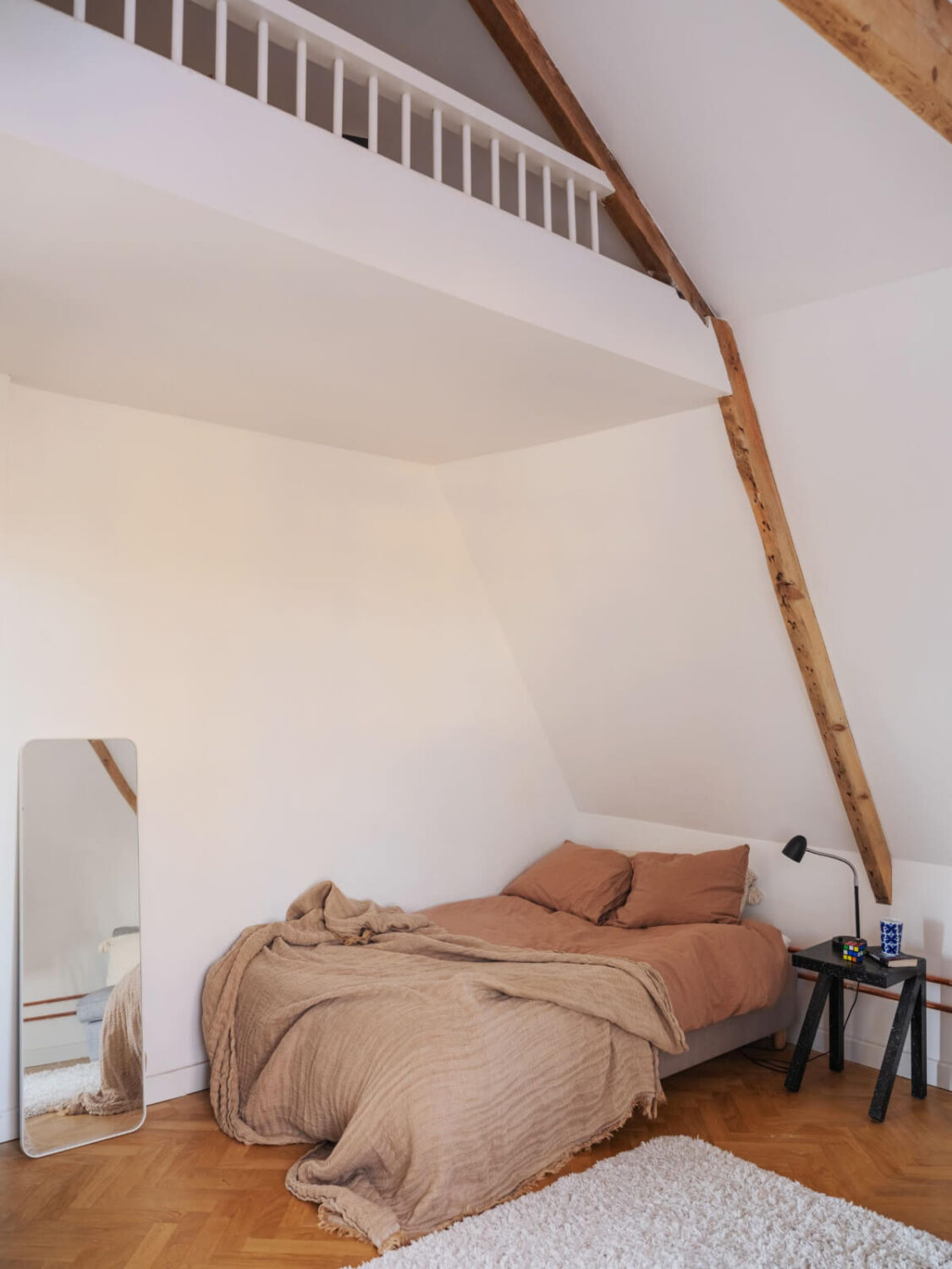 Painted Floorboards in a Unique Family Home in Sweden 27 attic bedroom with loft area