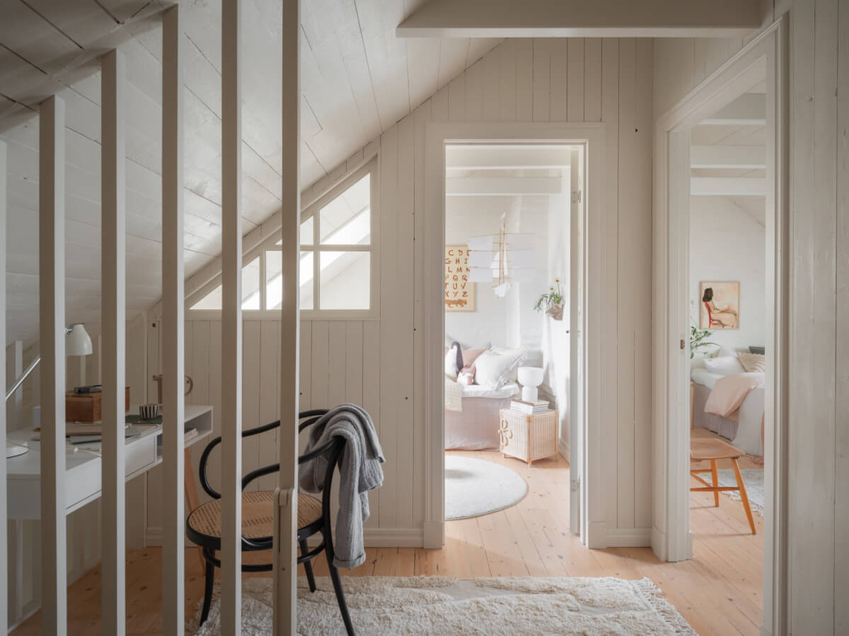 A Renovated Duplex Apartment with Exposed Brick Walls 16 attic floor with home office