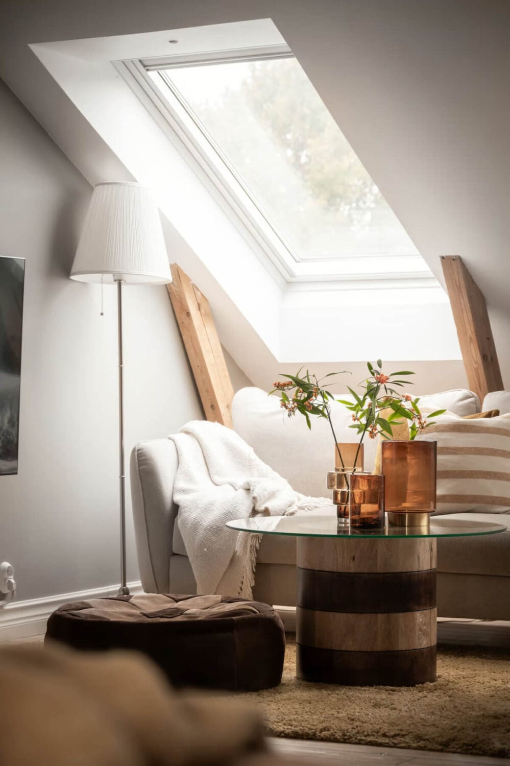 A Swedish Attic Apartment with Exposed Brick and Yellow Color Accents 14 attic sitting room detail
