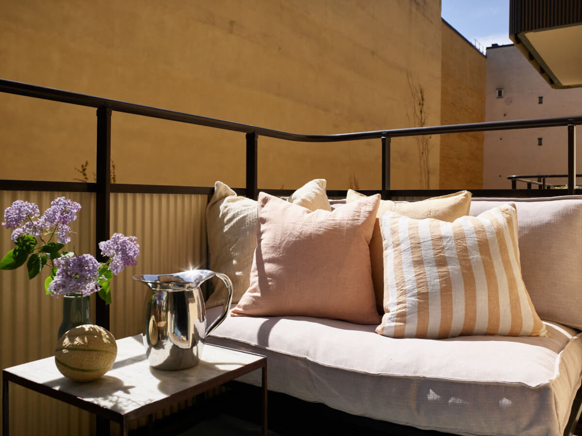 A Stockholm Apartment with a Beautifully Renovated Kitchen 3 balcony seating