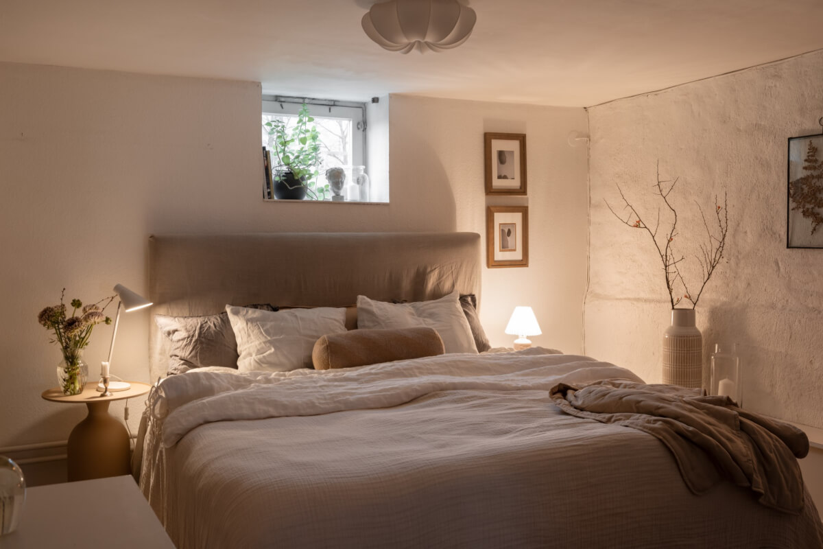 A Swedish Maisonette Apartment with Basement Bedrooms 20 basement bedroom brick wall tiny window