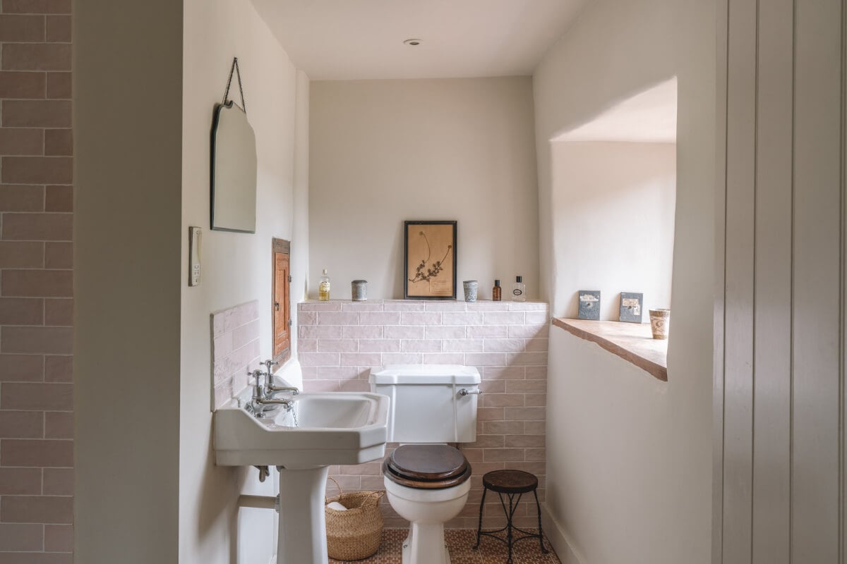 A Beautiful Renovated Country House in England 15 bathroom light pink tiles