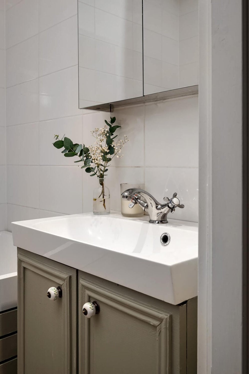 A Swedish Apartment with an Open Living Space and Period Features 28 bathroom sink