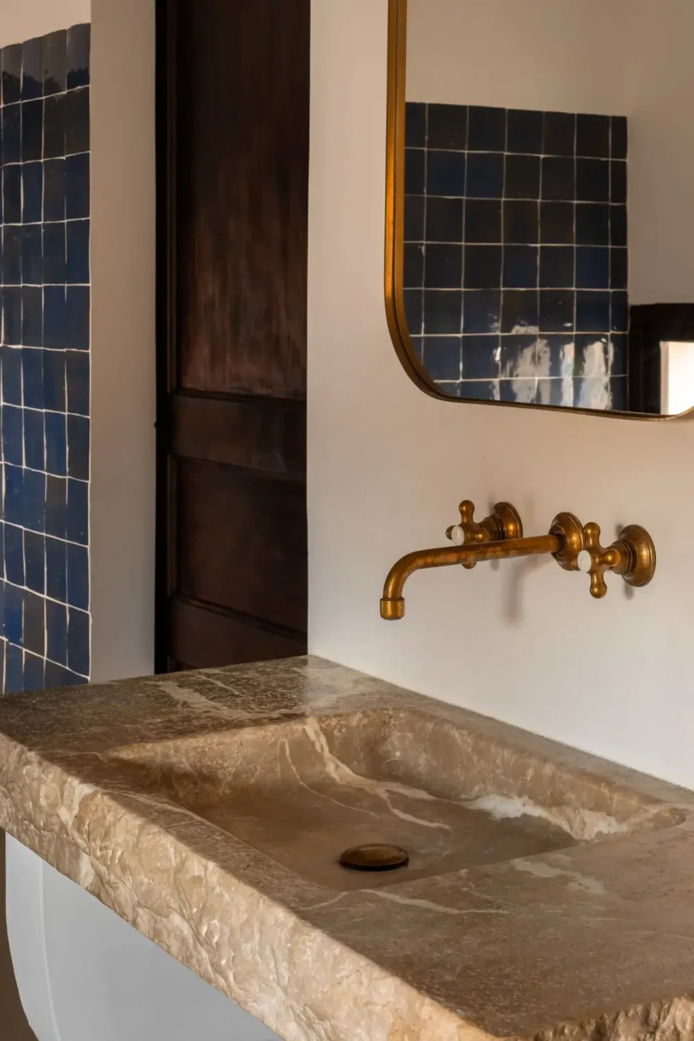 Old-World Craftsmanship and Contemporary Elegance in a Mallorcan Townhouse 11 bathroom sink detail