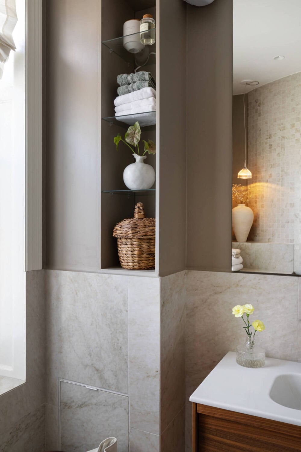 A Calm, Neutral Color Palette in a Classic Swedish Apartment 26 bathroom storage shelves