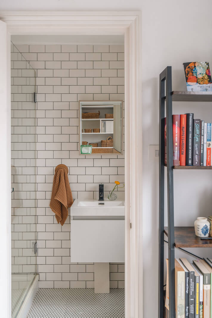 A Charming Light Edwardian House with a Tiny Garden 18 bathroom white subway tile